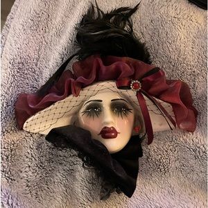 Ceramic woman’s face mask decor